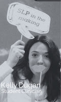 Kelly Dugan, student clinician, holding a paper cutout in front of her face in a black and white photo