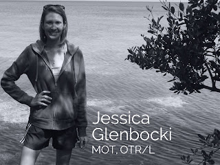 Jessica Glenbocki, MOT, OTR/L, standing by the water in a black and white portrait