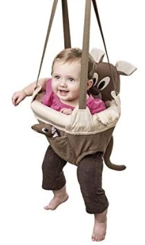 Baby smiling in a door-frame jumper seat