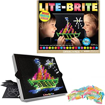 Lite-Brite toy box and lit pegboard showing a sailboat picture